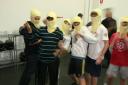 Kent's friends suiting
          up for go kart racing'